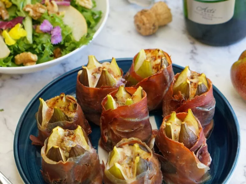 FIGS IN PANCETTA, CANDIED WALNUTS, FRESH PEARS AND GORGONZOLA